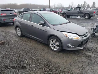2012 Ford Focus SEL with VIN 1FAHP3H26CL239437, listed as a IAAI auction lot 41164604 with 169,946 mi miles. Bid and sale history available at carsss.com. Image 1.