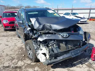 2016 Toyota RAV4 XLE with VIN 2T3RFREV4GW437875, listed as a IAAI auction lot 41694951 with 136,098 mi miles. Bid and sale history available at carsss.com. Image 6.