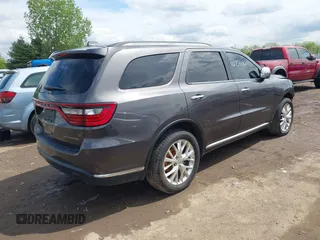 2014 Dodge Durango Citadel with VIN 1C4RDJEG7EC493379, listed as a IAAI auction lot 42159732 with 184,373 mi miles and . Bid and sale history available at DreamBid. Image 4.