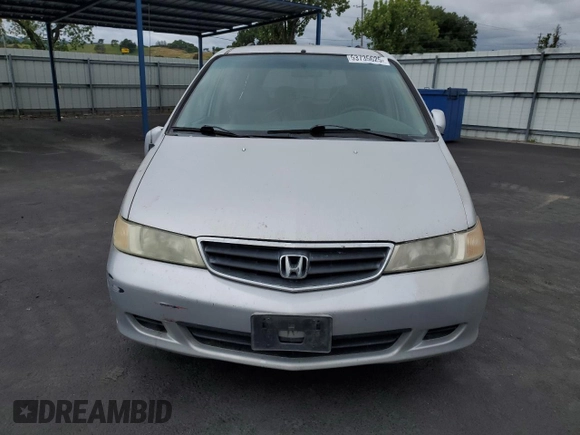2002 Honda Odyssey EX-L with VIN 2HKRL18902H506828, listed as a Copart auction lot 53735625 with 214,446 mi miles and Salvage title. Bid and sale history available at DreamBid. Image 5.