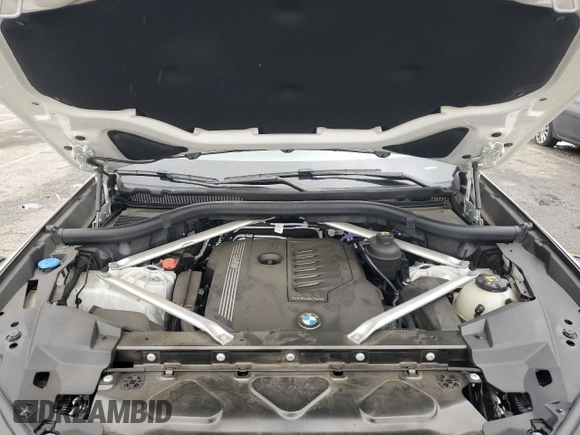 2022 BMW X6 xDrive40i z VIN 5UXCY6C08N9J21980, wystawiony jako Copart lot #48819745 z przebiegiem 24 431 mil mil oraz Szkoda całkowita • Salvage title. Historia ofert i sprzedaży dostępna na DreamBid. Obrazek 12.