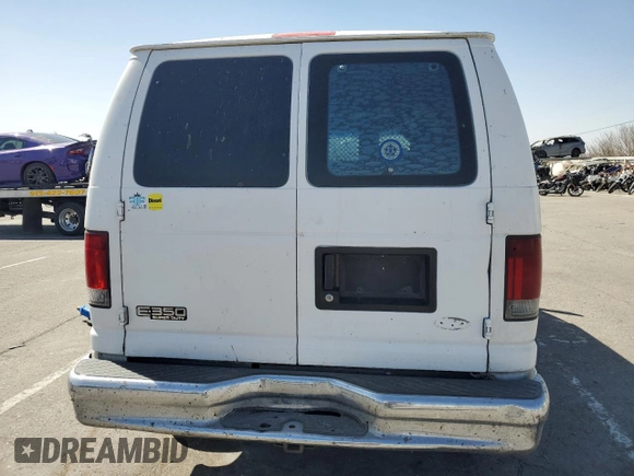 2007 Ford Econoline Cargo Commercial with VIN 1FTNE14W27DA67102, listed as a Copart auction lot 47770305 with 579,541 mi miles and Salvage Title. Bid and sale history available at DreamBid. Image 6.