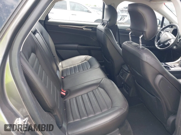 2013 Ford Fusion SE Hybrid with VIN 3FA6P0LU9DR247484, listed as a IAAI auction lot 42110685 with 202,531 mi miles. Bid and sale history available at carsss.com. Image 8.