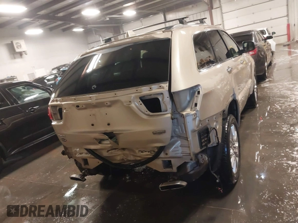 2015 Jeep Grand Cherokee Summit with VIN 1C4RJFJG5FC918837, listed as a IAAI auction lot 41126436 with 155,516 mi miles. Bid and sale history available at carsss.com. Image 17.
