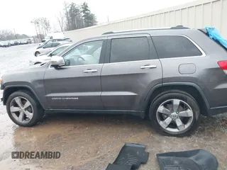 2015 Jeep Grand Cherokee Limited with VIN 1C4RJFBG8FC713253, listed as a IAAI auction lot 41757689 with 129,420 mi miles. Bid and sale history available at carsss.com. Image 13.