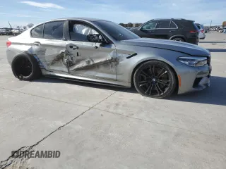 2019 BMW M5 Competition z VIN WBSJF0C54KB284808, wystawiony jako Copart lot #71974952 z przebiegiem 26 888 mil mil oraz . Historia ofert i sprzedaży dostępna na DreamBid. Obrazek 4.