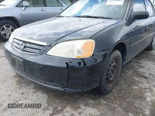 2002 Honda Civic LX with VIN 1HGES16552L060982, listed as a IAAI auction lot 42141884 with 202,659 mi miles and . Bid and sale history available at DreamBid. Image 6.