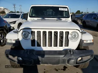 2023 Jeep Gladiator Sport S with VIN 1C6HJTAG4PL528847, listed as a Copart auction lot 64470375 with 36,177 mi miles and Salvage title. Bid and sale history available at DreamBid. Image 5.