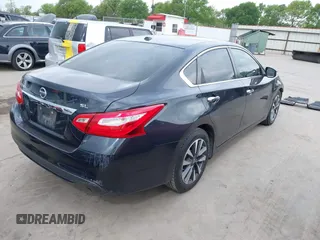 2017 Nissan Altima SV with VIN 1N4AL3AP5HC111300, listed as a IAAI auction lot 41884846 with 96,717 mi miles and . Bid and sale history available at DreamBid. Image 4.