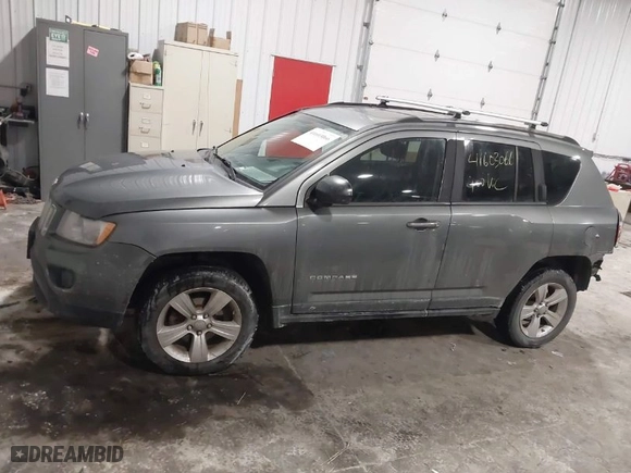 2011 Jeep Compass with VIN 1J4NF1FB8BD239417, listed as a IAAI auction lot 41603066 with 165,938 mi miles. Bid and sale history available at carsss.com. Image 14.