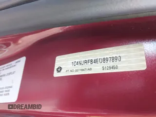 2014 Jeep Patriot Latitude with VIN 1C4NJRFB4ED897890, listed as a IAAI auction lot 41978399 with 76,688 mi miles. Bid and sale history available at carsss.com. Image 9.