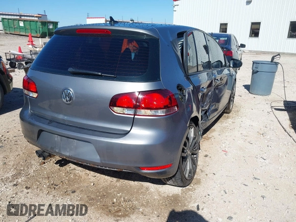 2012 Volkswagen Golf TDI z VIN WVWDM7AJ9CW240204, wystawiony jako IAAI lot #41837287 z przebiegiem 172 512 mil mil oraz . Historia ofert i sprzedaży dostępna na DreamBid. Obrazek 4.