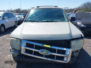 2008 Ford Escape XLT with VIN 1FMCU93198KC12899, listed as a IAAI auction lot 41768951 with 202,830 mi miles. Bid and sale history available at carsss.com. Image 10.