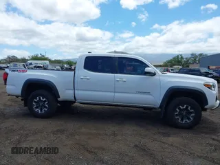 2018 Toyota Tacoma SR5 with VIN 3TMDZ5BN5JM048038, listed as a IAAI auction lot 42084922 with 79,718 mi miles and . Bid and sale history available at DreamBid. Image 13.