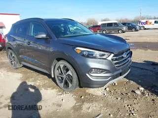 2018 Hyundai Tucson Value with VIN KM8J33A27JU749722, listed as a IAAI auction lot 41220859 with 58,599 mi miles. Bid and sale history available at carsss.com. Image 1.