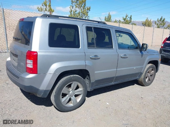 2014 Jeep Patriot Latitude with VIN 1C4NJRFB6ED883893, listed as a IAAI auction lot 41780864 with 119,610 mi miles. Bid and sale history available at carsss.com. Image 4.