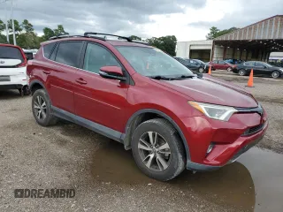 2018 Toyota RAV4 XLE with VIN 2T3WFREV7JW464160, listed as a Copart auction lot 63872925 with 70,826 mi miles and Salvage title. Bid and sale history available at DreamBid. Image 4.