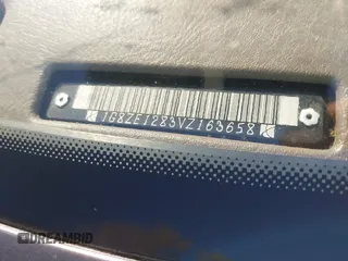 1997 Saturn SC z VIN 1G8ZE1283VZ163658, wystawiony jako IAAI lot #40494467 z przebiegiem 111 701 mil mil oraz . Historia ofert i sprzedaży dostępna na DreamBid. Obrazek 9.