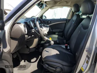 2012 MINI Countryman with VIN WMWZB3C58CWM02843, listed as a Copart auction lot 52131715 with Not Provided miles and Salvage Title. Bid and sale history available at DreamBid. Image 7.