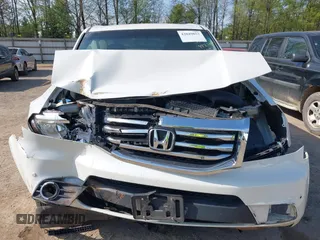 2013 Honda Pilot Touring with VIN 5FNYF3H92DB034731, listed as a IAAI auction lot 42049853 with 127,278 mi miles and . Bid and sale history available at DreamBid. Image 12.