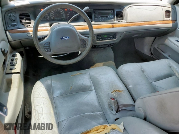 2004 Ford Crown Victoria LX z VIN 2FAFP74W54X184815, wystawiony jako Copart lot #57280725 z przebiegiem 294 513 mil mil oraz Szkoda całkowita • Salvage title. Historia ofert i sprzedaży dostępna na DreamBid. Obrazek 8.