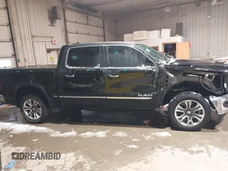 2022 Ram 1500 Limited with VIN 1C6SRFHT9NN481884, listed as a IAAI auction lot 41679409 with 47,571 mi miles and . Bid and sale history available at DreamBid. Image 14.