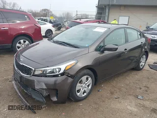 2017 Kia Forte S with VIN 3KPFL4A77HE113340, listed as a IAAI auction lot 42101024 with 127,852 mi miles and . Bid and sale history available at DreamBid. Image 2.