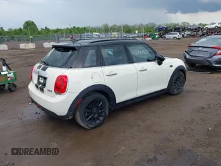 2015 MINI Hardtop 4 Door with VIN WMWXS5C52FT831291, listed as a IAAI auction lot 42179801 with 63,261 mi miles and . Bid and sale history available at DreamBid. Image 4.