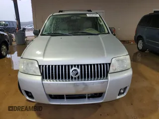 2005 Mercury Mariner Luxury z VIN 4M2YU561X5DJ04364, wystawiony jako Copart lot #44622345 z przebiegiem 265 744 mil mil oraz Szkody całkowita. Historia ofert i sprzedaży dostępna na DreamBid. Obrazek 5.