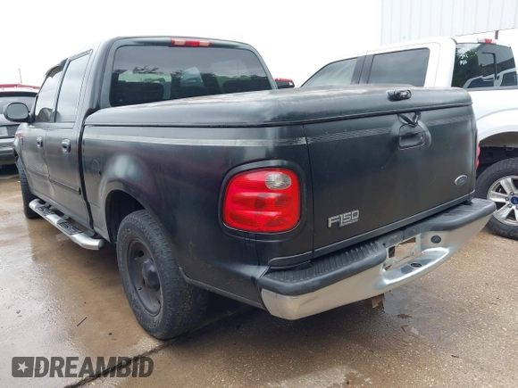 2003 Ford F-150 XLT with VIN 1FTRW07683KC30930, listed as a IAAI auction lot 42482529 with Not provided miles and . Bid and sale history available at DreamBid. Image 3.