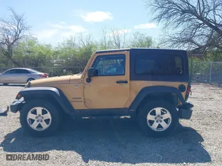 2013 Jeep Wrangler Sport with VIN 1C4AJWAG8DL676619, listed as a IAAI auction lot 41942627 with 130,306 mi miles. Bid and sale history available at carsss.com. Image 15.