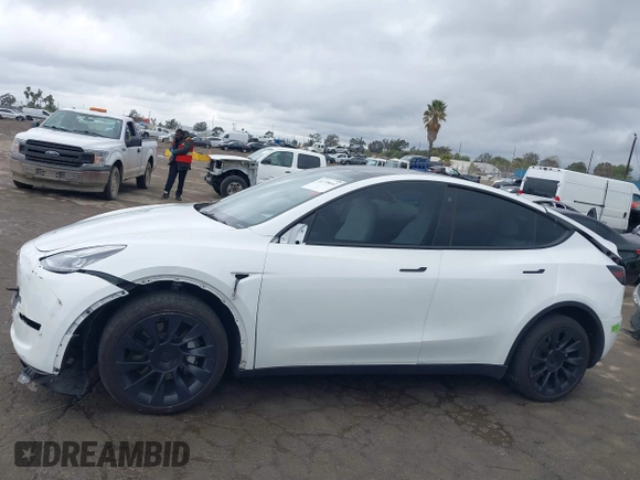 2023 Tesla Model Y Long Range with VIN 7SAYGDEE1PA106057, listed as a IAAI auction lot 41778642 with 1 mi miles. Bid and sale history available at carsss.com. Image 15.
