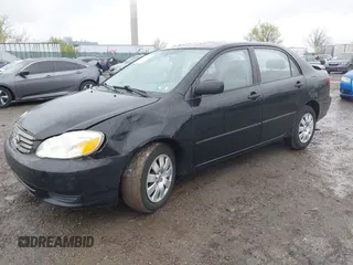 2004 Toyota Corolla CE with VIN 2T1BR32E14C260041, listed as a IAAI auction lot 42026930 with 180,814 mi miles. Bid and sale history available at carsss.com. Image 2.