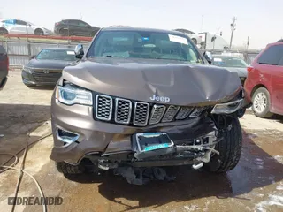 2020 Jeep Grand Cherokee Overland with VIN 1C4RJECG8LC323824, listed as a IAAI auction lot 41757922 with 64,792 mi miles. Bid and sale history available at carsss.com. Image 13.