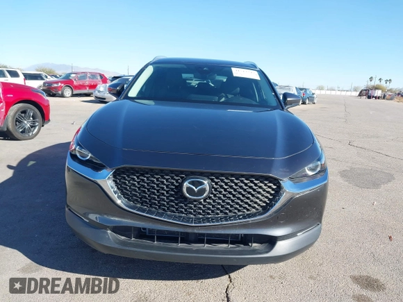 2022 Mazda CX-30 S Select z VIN 3MVDMBBL0NM415511, wystawiony jako IAAI lot #41513247 z przebiegiem Nie podano mil oraz . Historia ofert i sprzedaży dostępna na DreamBid. Obrazek 13.