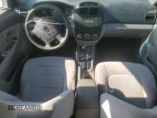 2009 Kia Spectra EX with VIN KNAFE221995624549, listed as a Copart auction lot 65963824 with 244,904 mi miles and Salvage Title. Bid and sale history available at carsss.com. Image 8.