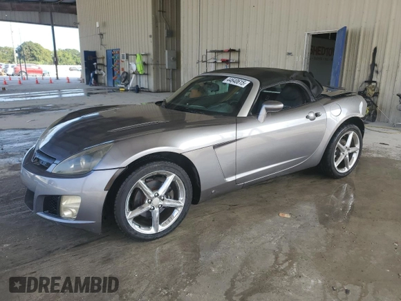 2009 Saturn Sky Red Line z VIN 1G8MG35XX9Y100409, wystawiony jako Copart lot #44640615 z przebiegiem Nie podano mil oraz Szkody całkowita. Historia ofert i sprzedaży dostępna na DreamBid. Obrazek 1.