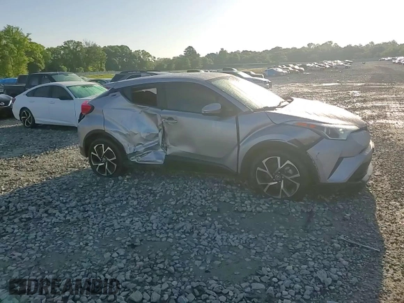 2019 Toyota C-HR XLE z VIN JTNKHMBX3K1050175, wystawiony jako Copart lot #52364415 z przebiegiem 69 811 mil mil oraz Szkoda całkowita • Salvage title. Historia ofert i sprzedaży dostępna na DreamBid. Obrazek 12.