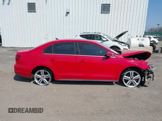 2015 Volkswagen Jetta Sedan 2.0T GLI SE with VIN 3VW5T7AJ2FM293898, listed as a IAAI auction lot 41753985 with 129,516 mi miles. Bid and sale history available at carsss.com. Image 14.