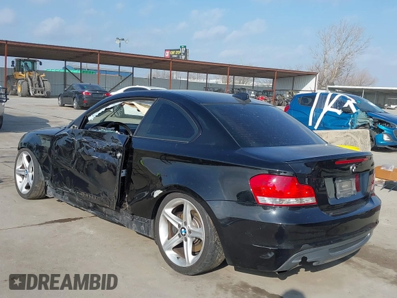 2010 BMW 1 Series 135i with VIN WBAUC7C52AVK81194, listed as a IAAI auction lot 41801510 with 123,925 mi miles and . Bid and sale history available at carsss.com. Image 3.