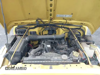 2000 Jeep Wrangler Sport with VIN 1J4FA49S9YP736984, listed as a IAAI auction lot 42055385 with 191,910 mi miles and . Bid and sale history available at DreamBid. Image 10.