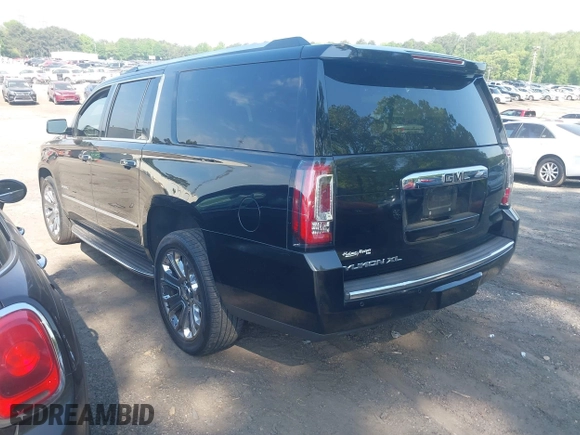 2015 GMC Yukon XL Denali with VIN 1GKS1JKJ5FR653076, listed as a IAAI auction lot 42072132 with 288,568 mi miles. Bid and sale history available at carsss.com. Image 3.