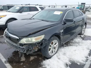 2011 Ford Taurus SEL with VIN 1FAHP2EW1BG114726, listed as a IAAI auction lot 41689674 with 312,338 mi miles. Bid and sale history available at carsss.com. Image 2.