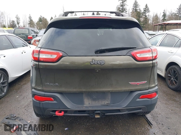 2015 Jeep Cherokee Trailhawk with VIN 1C4PJMBB5FW510514, listed as a IAAI auction lot 41492111 with 98,482 mi miles and . Bid and sale history available at DreamBid. Image 17.