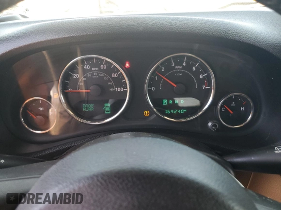 2015 Jeep Wrangler Rubicon Hard Rock z VIN 1C4BJWCG5FL561397, wystawiony jako Copart lot #61218185 z przebiegiem 164 240 mil mil oraz Czysty tytuł • Clean title. Historia ofert i sprzedaży dostępna na DreamBid. Obrazek 9.