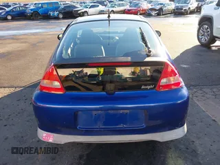 2002 Honda Insight z VIN JHMZE14722T000006, wystawiony jako IAAI lot #41049894 z przebiegiem 185 989 mil mil oraz . Historia ofert i sprzedaży dostępna na DreamBid. Obrazek 17.