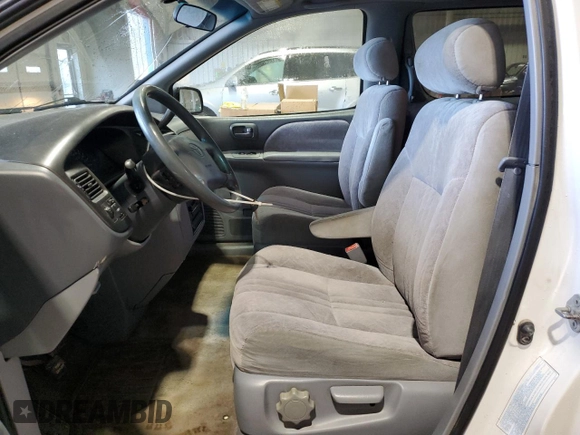 1999 Toyota Sienna LE with VIN 4T3ZF13C0XU110912, listed as a Copart auction lot 46736085 with 216,488 mi miles and Salvage Title. Bid and sale history available at carsss.com. Image 7.
