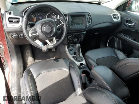 2020 Jeep Compass Latitude with VIN 3C4NJDBB6LT165048, listed as a Copart auction lot 56165965 with 83,351 mi miles and Salvage title. Bid and sale history available at DreamBid. Image 8.