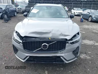 2024 Volvo XC60 Recharge Plug-In Hybrid Plus Dark Theme with VIN YV4H60DL1R1763252, listed as a IAAI auction lot 41731933 with 8,959 mi miles. Bid and sale history available at carsss.com. Image 6.