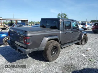 2021 Jeep Gladiator Willys with VIN 1C6HJTAG0ML615446, listed as a Copart auction lot 60571375 with 62,174 mi miles and Salvage title. Bid and sale history available at DreamBid. Image 3.